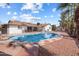 Stunning kidney shaped pool with a large backyard at 4421 W Laurie Ln, Glendale, AZ 85302