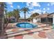 Inviting kidney-shaped pool with flagstone decking at 4421 W Laurie Ln, Glendale, AZ 85302