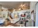 Two-story living room with fireplace and high ceilings at 46107 W Morning View Ln, Maricopa, AZ 85139