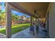 Covered patio with ceiling fans, outdoor furniture, and a view of the backyard at 46107 W Morning View Ln, Maricopa, AZ 85139