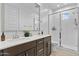 Modern bathroom with double sinks, a large shower, and elegant finishes at 4717 S Ferric --, Mesa, AZ 85212