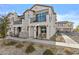 Two-story townhome with balcony, landscaping, and walkway at 4717 S Ferric --, Mesa, AZ 85212