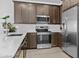 Well-equipped kitchen featuring stainless steel appliances and ample cabinetry at 4717 S Ferric --, Mesa, AZ 85212