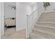 Modern staircase with simple white railing and carpet at 4717 S Ferric --, Mesa, AZ 85212