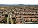 Aerial view of community, showing many houses at 5089 S Harvest St, Gilbert, AZ 85298