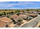 Aerial view of house and neighborhood, mountain views at 5089 S Harvest St, Gilbert, AZ 85298