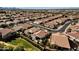 Aerial view of neighborhood, showing street and houses at 5089 S Harvest St, Gilbert, AZ 85298