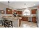 Modern kitchen with granite countertops and stainless steel appliances at 5089 S Harvest St, Gilbert, AZ 85298