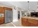 Spacious kitchen with island, stainless steel appliances, and granite countertops at 5089 S Harvest St, Gilbert, AZ 85298