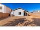 Spacious backyard with gravel and a detached structure at 509 E Daniella Dr, San Tan Valley, AZ 85140