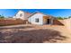 Large backyard with gravel landscaping and a detached structure at 509 E Daniella Dr, San Tan Valley, AZ 85140