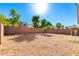 Large gravel backyard with block wall at 509 E Daniella Dr, San Tan Valley, AZ 85140