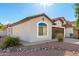 Front view of charming house with landscaping at 509 E Daniella Dr, San Tan Valley, AZ 85140