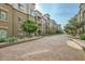 Community walkway with landscaping and building view at 5450 E Deer Valley Dr # 1180, Phoenix, AZ 85054