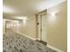 Clean condo hallway with doors to units at 5450 E Deer Valley Dr # 1180, Phoenix, AZ 85054