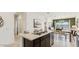 Kitchen island with double sinks and marble countertops at 5501 E Rock Bush Ln, San Tan Valley, AZ 85140