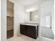 Bathroom with double vanity and granite countertop at 5545 E Rock Bush Ln, San Tan Valley, AZ 85140