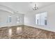 Dining area with tile floors and view of the kitchen and entryway at 6229 S Moccasin Trl, Gilbert, AZ 85298