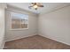 Charming bedroom with a window and carpet at 6497 S Twilight Ct, Gilbert, AZ 85298