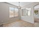 Bright dining area with tile floors and a light-filled window at 6497 S Twilight Ct, Gilbert, AZ 85298