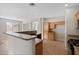 Bright kitchen with an island and wood cabinets at 6497 S Twilight Ct, Gilbert, AZ 85298