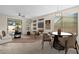 Virtually staged living room features a neutral color palette and plenty of natural light at 6497 S Twilight Ct, Gilbert, AZ 85298