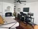 Bedroom with a daybed, fireplace, and dual workspaces at 7028 N Barbados Pl, Phoenix, AZ 85021