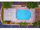 Communal swimming pool with a pergola and lounge chairs at 7028 N Barbados Pl, Phoenix, AZ 85021