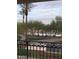 Scenic balcony view of a canal and palm trees at 7175 E Camelback Rd # 207, Scottsdale, AZ 85251