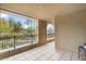 Spacious balcony with views of resort-style grounds and palm trees at 7175 E Camelback Rd # 207, Scottsdale, AZ 85251