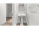 Elegant powder room with pedestal sink and decorative mirror at 7175 E Camelback Rd # 207, Scottsdale, AZ 85251