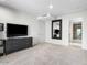 Spacious bedroom with wall-to-wall carpet, large mirror, and access to bathroom at 7175 E Camelback Rd # 207, Scottsdale, AZ 85251