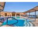 Rooftop pool with lounge chairs, a spa, and city views at 7175 E Camelback Rd # 207, Scottsdale, AZ 85251