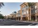 Upscale retail area with palm trees and attractive building facades at 7175 E Camelback Rd # 207, Scottsdale, AZ 85251