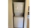 Stackable washer and dryer in a compact laundry closet at 7510 E Thomas Rd # 134, Scottsdale, AZ 85251