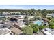 Aerial view showcasing the community's pool, tennis courts, landscaping, and mountain views at 7705 E Doubletree Ranch Rd # 55, Scottsdale, AZ 85258