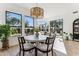 Breakfast nook with a round table and chairs, overlooking the backyard at 7705 E Doubletree Ranch Rd # 55, Scottsdale, AZ 85258