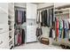 Large walk-in closet with ample shelving and hanging space at 7705 E Doubletree Ranch Rd # 55, Scottsdale, AZ 85258