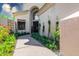 Front entry with walkway, landscaping, and a dark-colored door at 7705 E Doubletree Ranch Rd # 55, Scottsdale, AZ 85258