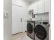 Clean laundry room with modern washer and dryer at 7705 E Doubletree Ranch Rd # 55, Scottsdale, AZ 85258