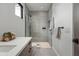 Modern bathroom featuring a glass-enclosed shower, sleek fixtures, and contemporary design with neutral color palette at 8255 E Morgan Trl, Scottsdale, AZ 85258