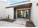 Outdoor courtyard with modern design, tile flooring, and connection to interior spaces at 8255 E Morgan Trl, Scottsdale, AZ 85258