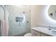 Clean bathroom with a walk-in shower and updated fixtures at 8277 E Tailspin Ln, Scottsdale, AZ 85255