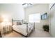 Cozy bedroom with a queen-size bed, nightstand, and ample closet space at 8277 E Tailspin Ln, Scottsdale, AZ 85255