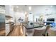 Modern kitchen with large island and seating for eight at 8277 E Tailspin Ln, Scottsdale, AZ 85255