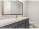 Bathroom boasts a vanity with quartz countertop and modern fixtures at 8569 N 175Th Ln, Waddell, AZ 85355