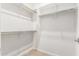 Closet with hanging rods and additional shelving at 8569 N 175Th Ln, Waddell, AZ 85355