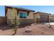 New construction home with front yard landscaping at 8569 N 175Th Ln, Waddell, AZ 85355