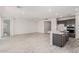 Open concept kitchen with island, gray cabinets, and white quartz countertops at 8569 N 175Th Ln, Waddell, AZ 85355