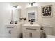 Modern bathroom with double vanity and updated fixtures at 8732 E Valley Vista Dr, Scottsdale, AZ 85250